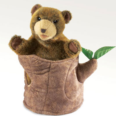 Bear in a tree stump puppet by Folkmanis 1